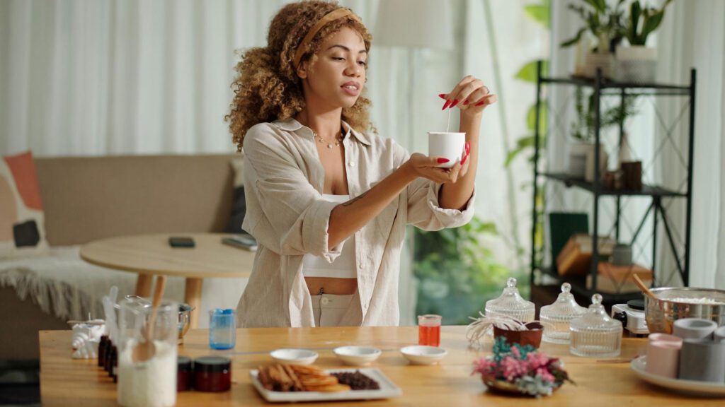 woman making scenting candles